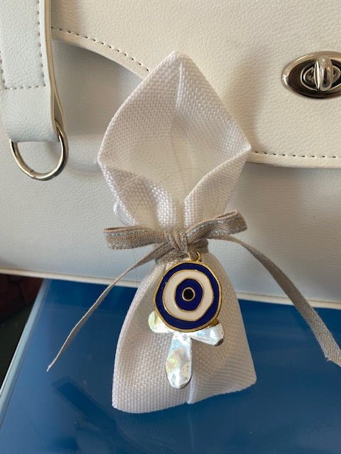Bomboniere - White Pouch with Silver Cross and Mati Charm | Pandora Designs Melbourne